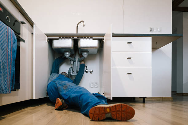 Professional Drain Cleaning technician working in Belmont, CA